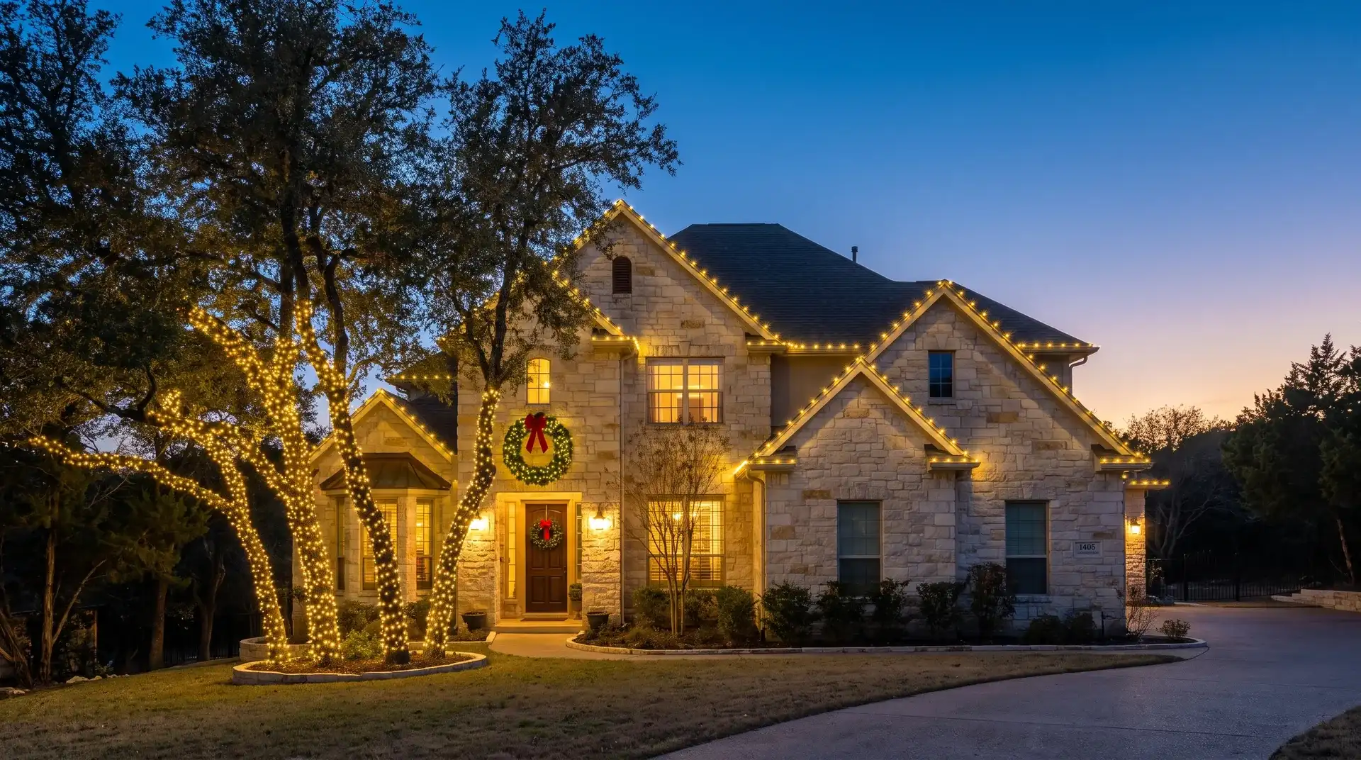 Professional Christmas light installation on a limestone Hill Country home in Cedar Park, TX