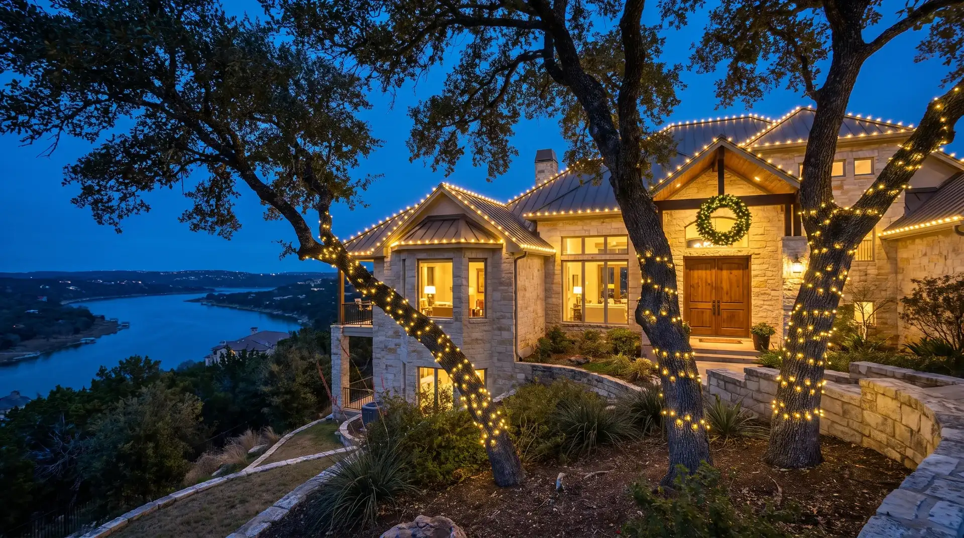Professional Christmas light installation on a Lake Travis hillside estate in Lakeway, TX